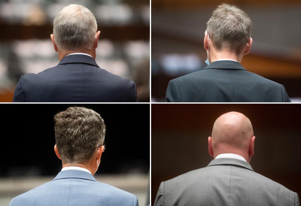 A combination picture shows the four defendants at the start of the trial of former Volkswagen executives charged with misco<em></em>nduct over their role in the carmaker's manipulation of diesel emissions testing, in Brunswick, Germany September 16, 2021.  Julian Stratenschulte/Pool via REUTERS