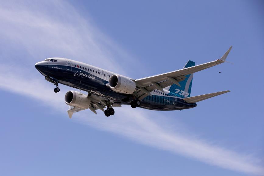 A Boeing 737 MAX airplane lands after a test flight at Boeing Field in Seattle, Washington, U.S. June 29, 2020. REUTERS/Karen Ducey//File Photo