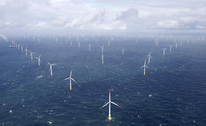 Power-generating windmill turbines are pictured at the 'Amrumbank West' offshore windpark in the northern sea near the island of Amrum, Germany September 4, 2015. REUTERS/Morris Mac Matzen      