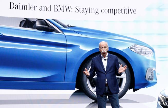 Dieter Zetsche, CEO of Daimler AG, talks a<em></em>bout the Daimler - BMW collaboration on the Mercedes stand at the 89th Geneva Internatio<em></em>nal Motor Show in Geneva, Switzerland March 5, 2019. REUTERS/Denis Balibouse