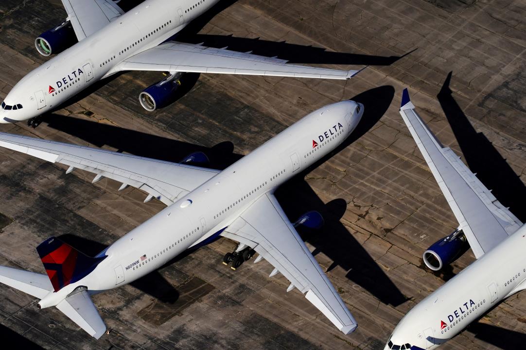 Delta Air Lines passenger planes are seen parked due to flight reductions made to slow the spread of coro<em></em>navirus disease (COVID-19), at Birmingham-Shuttlesworth Internatio<em></em>nal Airport in Birmingham, Alabama, U.S. March 25, 2020.  REUTERS/Elijah Nouvelage