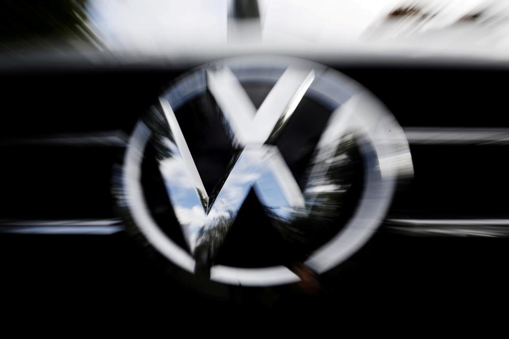 The VW logo is seen at the site of the first hearing of a co<em></em>nsumer group's class action suit on behalf of Volkswagen owners against VW over the diesel emissions cheating scandal, at the Higher Regio<em></em>nal Court in Braunschweig, Germany, September 30, 2019.     REUTERS/Michele Tantussi