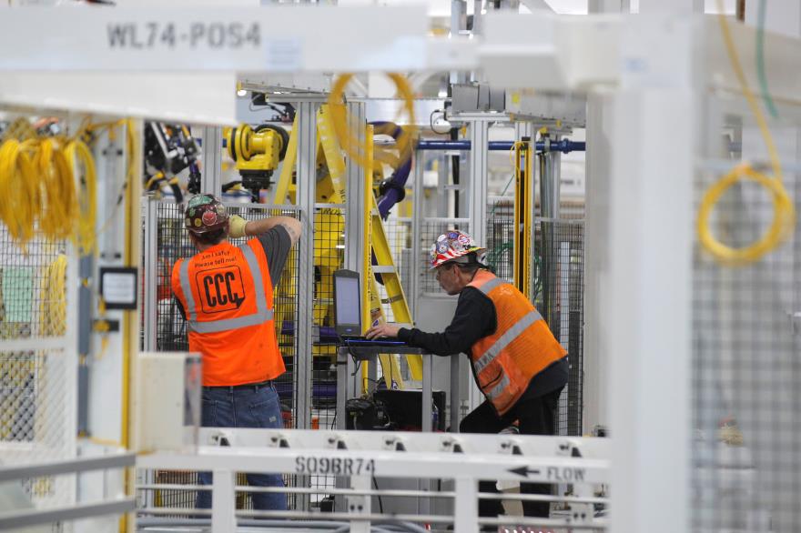 Workers are seen at the FCA Mack Assembly plant in Detroit, Michigan, U.S., March 10, 2020. REUTERS/Brendan McDermid