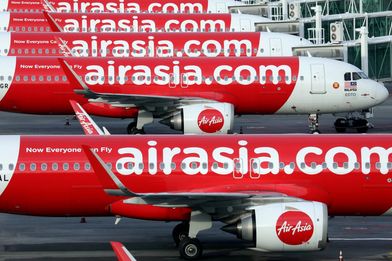 Airasia planes are seen parked at Kuala Lumpur Internatio<em></em>nal Airport 2, amid the coro<em></em>navirus disease (COVID-19) outbreak in Sepang, Malaysia October 6, 2020. REUTERS/Lim Huey Teng