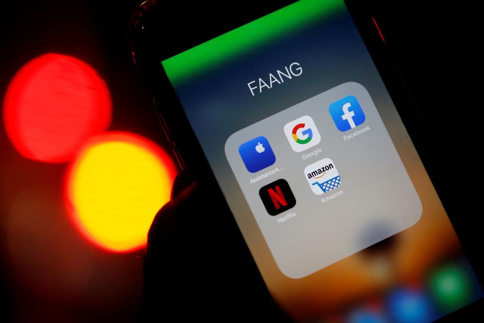 The logos of mobile apps, Google, Amazon, Facebook, Apple and Netflix, are displayed on a screen in this illustration picture taken December 3, 2019. REUTERS/Regis Duvignau