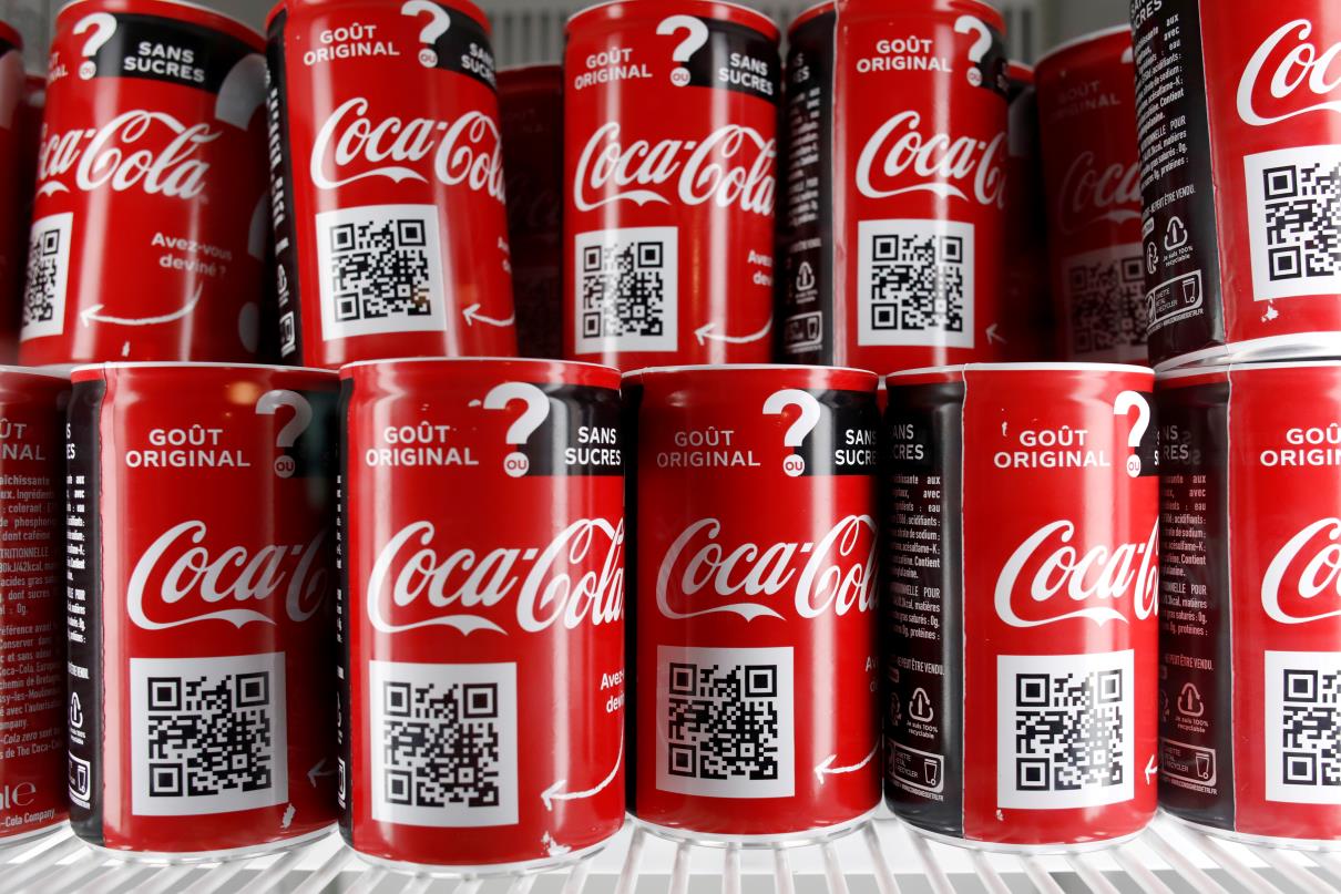 Cans of Coca-Cola are pictured in the refrigerator during an event in Paris, France, March 21, 2019. REUTERS/Benoit Tessier