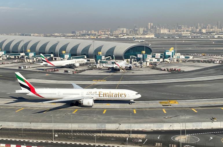 Emirates airliners are seen on the tarmac in a general view of Dubai Internatio<em></em>nal Airport in Dubai, United Arab Emirates January 13, 2021. REUTERS/Abdel Hadi Ramahi/File Photo