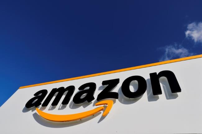 The logo of Amazon is seen at the company logistics centre in Boves, France, October 6, 2021 REUTERS/Pascal Rossignol/File Photo