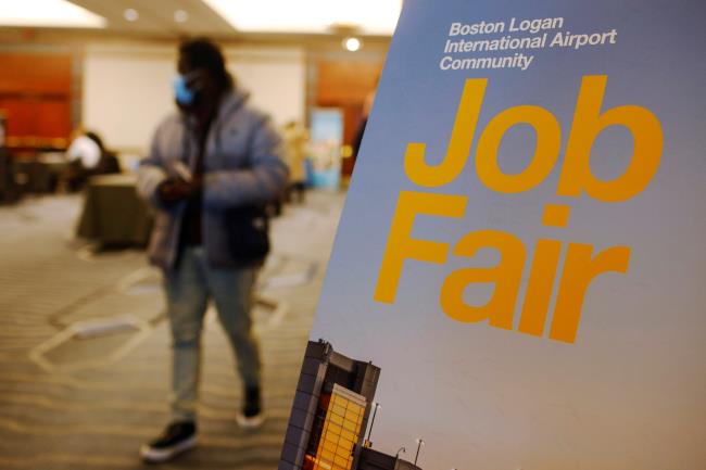 A job seeker leaves the job fair for airport related employment at Logan Internatio<em></em>nal Airport in Boston, Massachusetts, U.S., December 7, 2021.   REUTERS/Brian Snyder