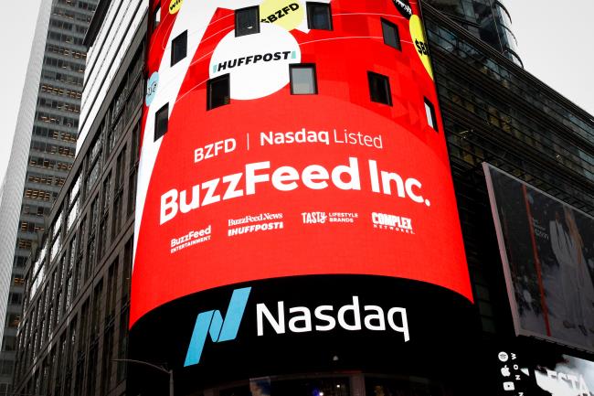 A screen announces the debut of BuzzFeed Inc. at the Nasdaq Market in Times Square in New York City, U.S., December 6, 2021.  REUTERS/Brendan McDermid