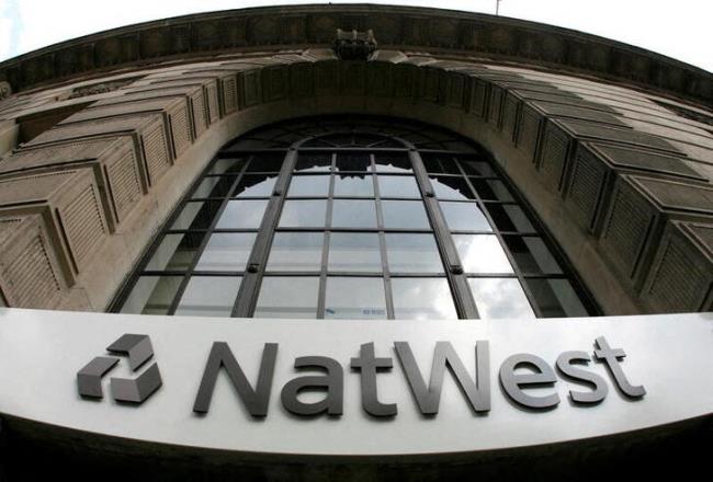 Signage at a branch of NatWest Bank pictured in central London,  May 21, 2008.  REUTERS/Luke MacGregor