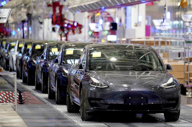 Tesla's China-made Model 3 vehicles are seen during a delivery event at its factory in Shanghai, China January 7, 2020. REUTERS/Aly Song