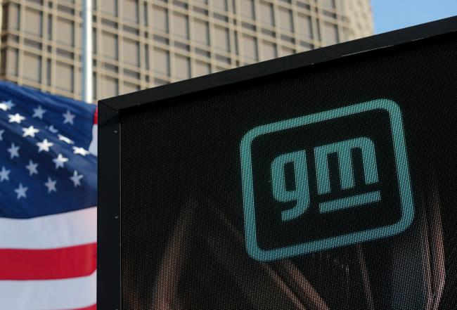 The new GM logo is seen on the facade of the General Motors headquarters in Detroit, Michigan, U.S., March 16, 2021. Picture taken March 16, 2021.  REUTERS/Rebecca Cook