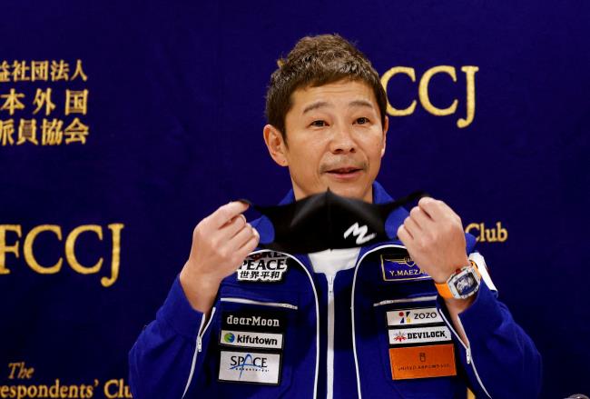 Japanese billio<em></em>naire Yusaku Maezawa, who returned to Earth last mo<em></em>nth after a 12-day journey into space, attends a news co<em></em>nference after returning to Japan at the Foreign Correspondents' Club of Japan, in Tokyo, Japan January 7, 2022.  REUTERS/Issei Kato