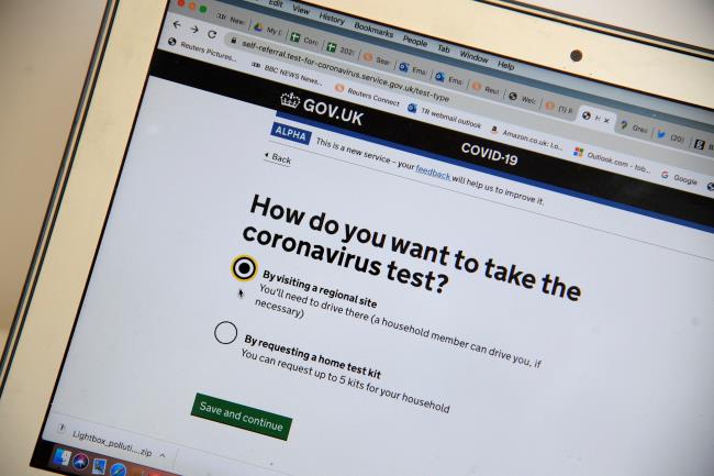 An illustration of the UK Government's website to book coro<em></em>navirus disease (COVID-19) home test kits, in London, Britain, April 24, 2020. REUTERS/Toby Melville/Illustration