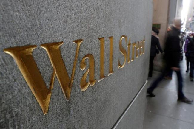 A street sign, Wall Street, is seen outside New York Stock Exchange (NYSE) in New York City, New York, U.S., January 3, 2019. REUTERS/Shannon Stapleton