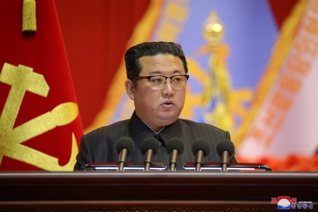 North Korean leader Kim Jong Un speaks during the Eighth Co<em></em>nference of Military Educatio<em></em>nists of the Korean People's Army at the April 25 House of Culture in Pyongyang, North Korea in this undated photo released on December 7, 2021. KCNA via REUTERS      