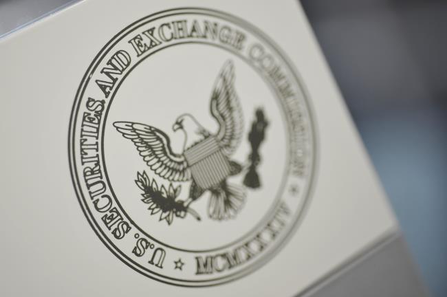 The U.S. Securities and Exchange Commission logo adorns an office door at the SEC headquarters in Washington, June 24, 2011. Picture taken June 24, 2011. REUTERS/Jo<em></em>nathan Ernst