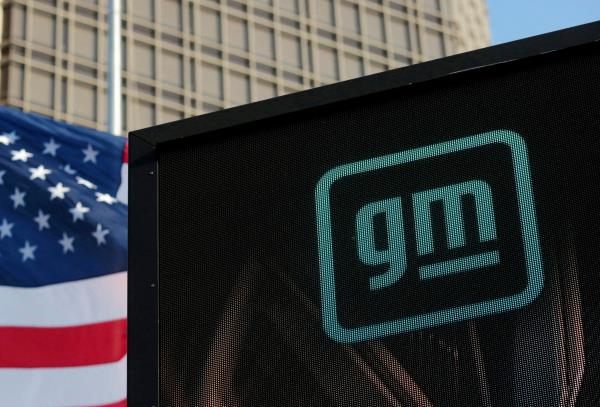 Logo of GM atop the company headquarters