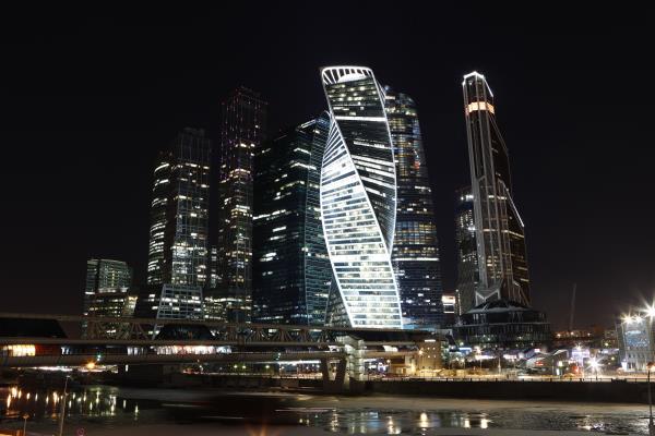 A combination photo shows the Moscow Internatio<em></em>nal Business Centre before the lights were switched off for Earth Hour in Moscow