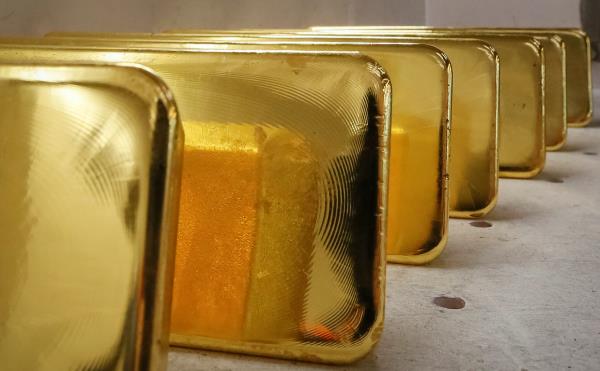 Newly casted ingots of 99.99 percent pure gold are stored after weighing at the Krastsvetmet non-ferrous text<em></em>areals plant in the Siberian city of Krasnoyarsk