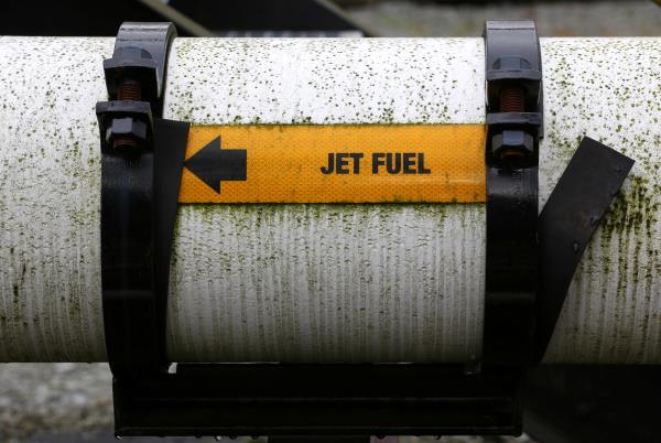 A pipe transporting jet fuel offloaded from barges in seen at Kinder Morgan's Westridge Terminal on Burrard Inlet in Burnaby