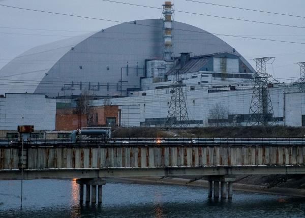 A general view shows the New Safe Co<em></em>nfinement structure over the old sarcophagus covering the damaged fourth reactor at the Chernobyl Nuclear Power Plant, in Chernobyl