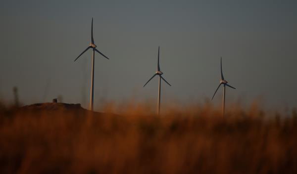 Electric power wind mills are seen on the outskirts of Lisbon