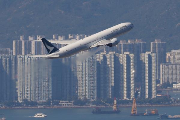 A Cathay Pacific aircraft takes off at the airport in Hong Kong