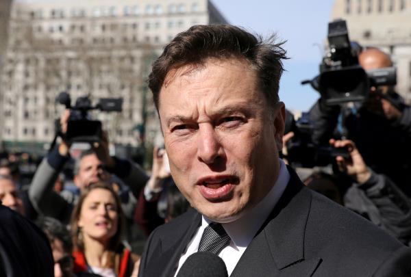 Tesla CEO Elon Musk leaves Manhattan federal court after a hearing on his fraud settlement with the SEC in New York