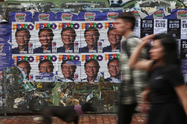 Posters with the image of Colombian left-wing presidential candidate Gustavo Petro, of the Historic Pact coalition are pictured ahead the second round of elections in Bogota