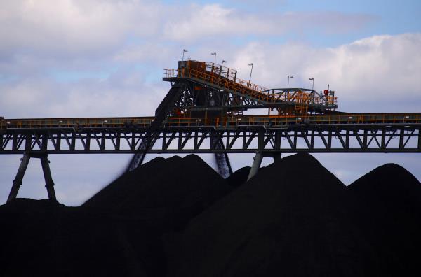 Coal is unloaded o<em></em>nto large piles at the Ulan Coal mines near the central New South Wales rural town of Mudgee, Australia