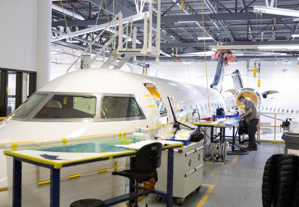 Bombardier employees work on delivery preparations of Global aircraft in Montreal