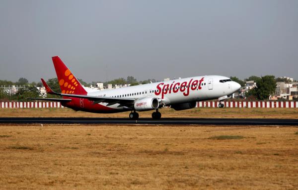 A SpiceJet Boeing 737 passenger aircraft takes off from Sardar Vallabhbhai Patel internatio<em></em>nal airport in Ahmedabad