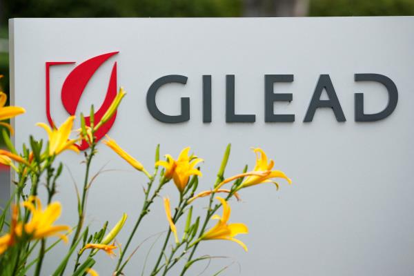 The logo of Gilead Sciences Inc pharmaceutical company is seen in Oceanside, California