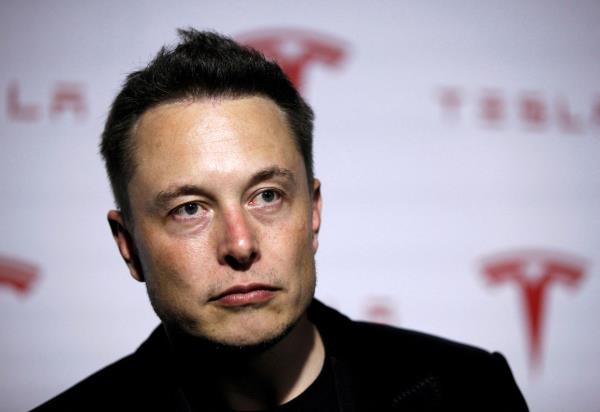 Tesla Motors Inc CEO Musk talks a<em></em>bout Tesla's new battery swapping program in Hawthorne