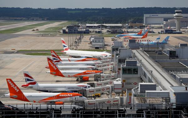 British Airways and Easyjet aircraft are parked at the South Terminal at Gatwick Airport, in Crawley