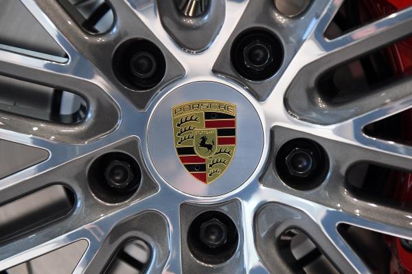 The logo of German carmaker Porsche AG is seen before the company's annual news co<em></em>nference in Stuttgart