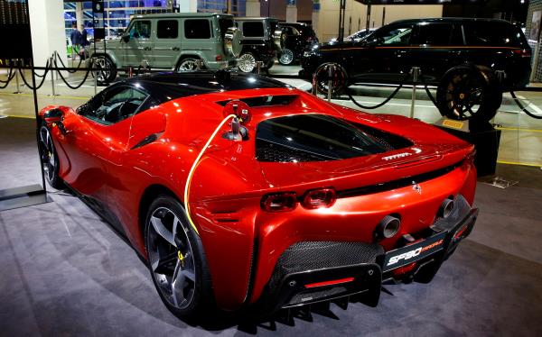 A Ferrari SF90 Stradale hybrid sports car is seen during at the Auto Zurich Car Show in Zurich