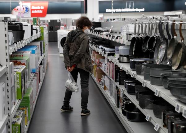 A woman shops at co<em></em>nsumer electro<em></em>nics retailer Media Markt in Budapest