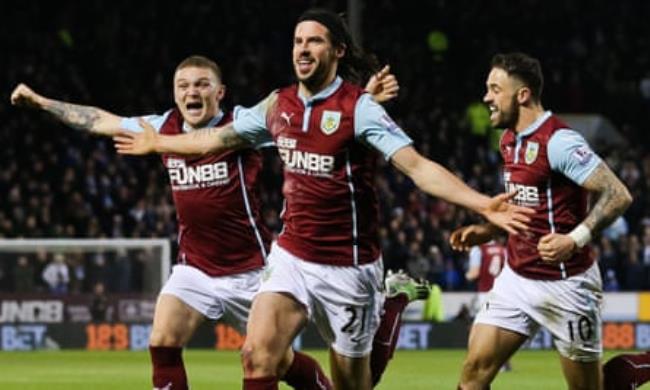 George Boyd celebrates after scoring Burnley’s winning goal against Manchester City in March 2015. He now plays for Wythenshawe Town.