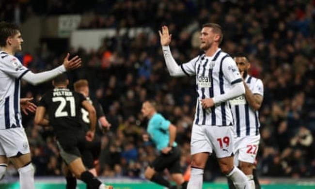 West Brom’s John Swift (right) celebrates with Tom Fellows after making it 2-0 against Rotherham.