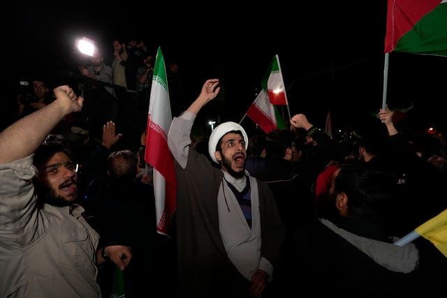 Iranian demo<em></em>nstrators chant slogans during their anti-Israeli gathering in front of the British embassy in Tehran, Iran 