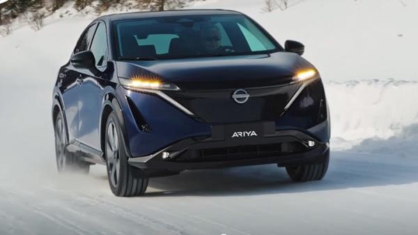 Nissan Ariya electric SUV to drive Pole to Pole - blue, front view, driving in snow
