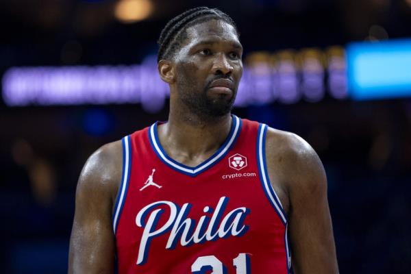 Philadelphia 76ers' Joel Embiid looks on during the NBA basketball game against the Orlando Magic, Friday, April 12, 2024, in Philadelphia. The 76ers won 125-113. (AP Photo/Chris Szagola)