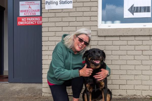 Skibbereen resident Kay Quinn and her dog 'Buster' after voting in Skibbereen on local and European election day.