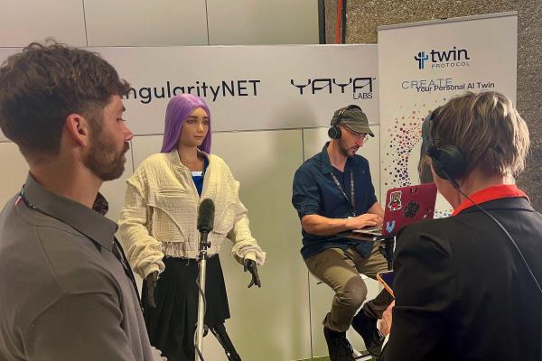 Journalists interview robot Desdemona at AI for Good Summit in Geneva.
