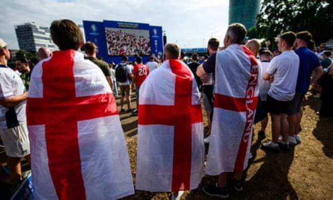 Fans watching the game at the fan zone during England’s match with Denmark