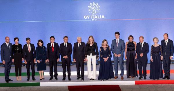 Canadian Prime Minister Justin Trudeau, European Commission President Ursula von der Leyen and U.S. President Joe Biden stand together on the first day of the G7 summit, in Savelletri, Italy.