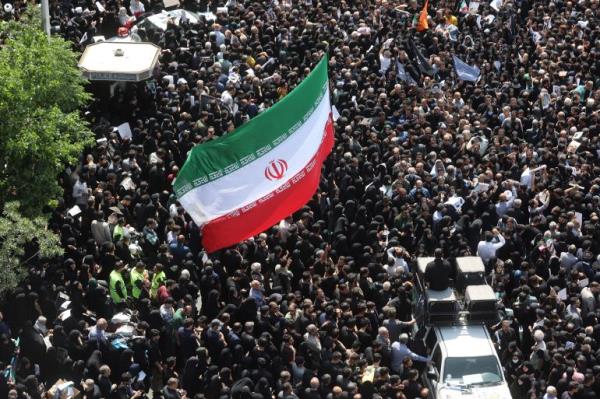 Mourners attend the funeral of Iranian President Ebrahim Raisi,